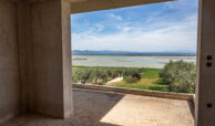 Building with Panoramic Sea and Mountain Views