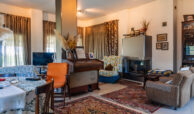 Living room with fireplace in a detached house in Thermi, Thessaloniki