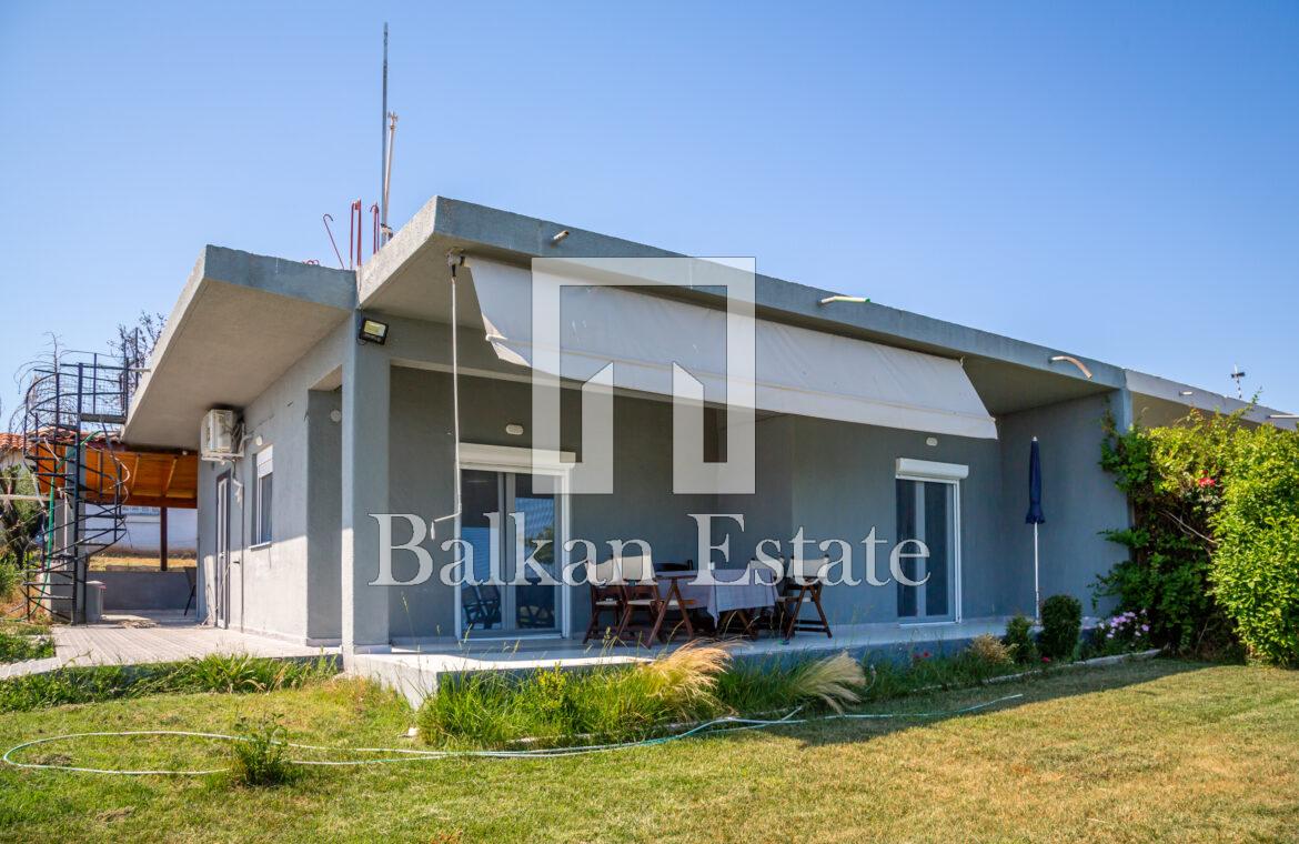 Spacious plot with renovated house for sale in Chalkidiki